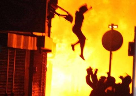 Woman Jumping from Building During London Riots